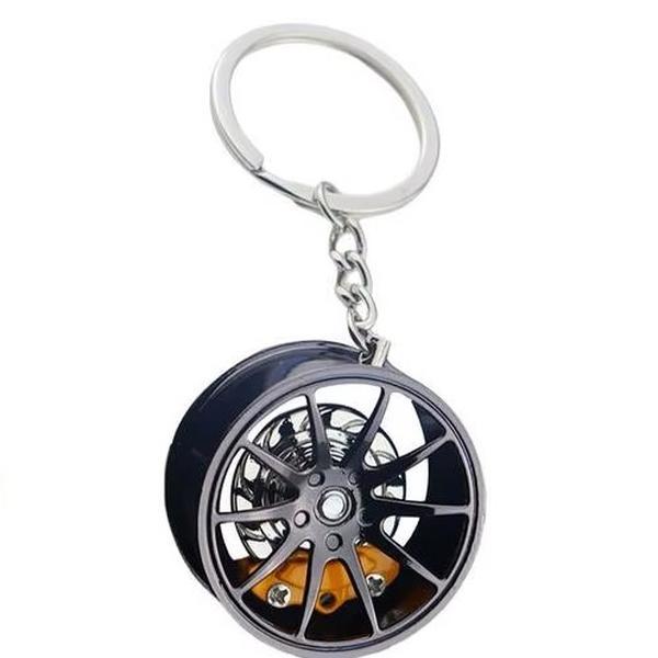 Alloy Wheel with Moving Yellow Brake Caliper Keychain